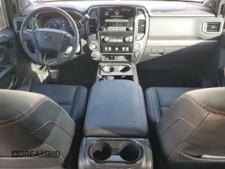 2023 Nissan Titan SV z VIN 1N6AA1ED7PN118575, wystawiony jako Copart lot #77127554 z przebiegiem 16 630 mil mil oraz Szkoda całkowita • Salvage title. Historia ofert i sprzedaży dostępna na DreamBid. Obrazek 8.