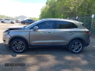 2019 Lincoln MKC Reserve with VIN 5LMCJ3D93KUL53163, listed as a IAAI auction lot 42097105 with 71,066 mi miles and . Bid and sale history available at DreamBid. Image 14.