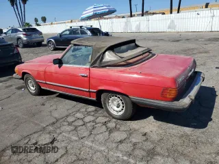 1985 Mercedes-Benz SL with VIN WDBBA45C9FA017476, listed as a Copart auction lot 74177774 with 135,805 mi miles and Salvage title. Bid and sale history available at DreamBid. Image 2.