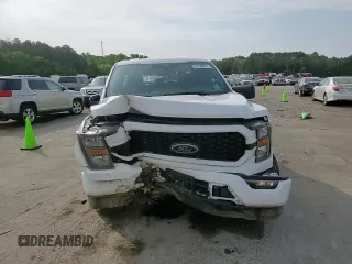 2023 Ford F-150 XL with VIN 1FTEX1EP8PKF69707, listed as a Copart auction lot 53138065 with 18,816 mi miles and Salvage title. Bid and sale history available at DreamBid. Image 11.