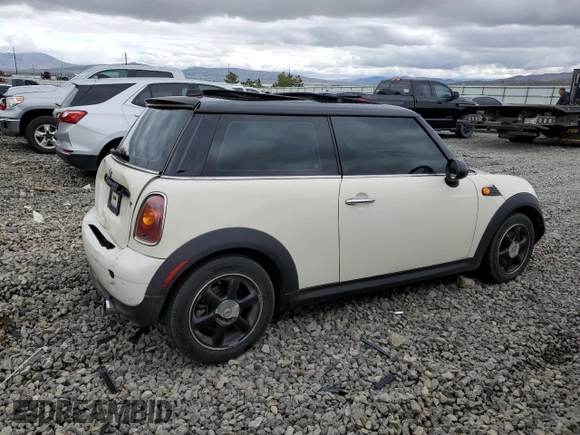 2007 MINI Hardtop with VIN WMWMF33567TT56922, listed as a Copart auction lot 56598665 with 66,605 mi miles and Salvage title. Bid and sale history available at DreamBid. Image 3.