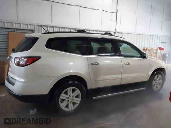 2013 Chevrolet Traverse LT with VIN 1GNKVGKD4DJ204519, listed as a IAAI auction lot 41600391 with 190,295 mi miles and . Bid and sale history available at DreamBid. Image 13.