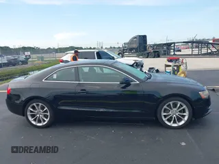 2013 Audi A5 Premium with VIN WAUCFAFR4DA042899, listed as a IAAI auction lot 42682496 with 60,274 mi miles and . Bid and sale history available at DreamBid. Image 13.