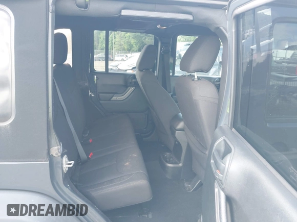 2017 Jeep Wrangler Unlimited Sport with VIN 1C4BJWDG6HL555402, listed as a IAAI auction lot 42255790 with 113,118 mi miles and . Bid and sale history available at DreamBid. Image 8.