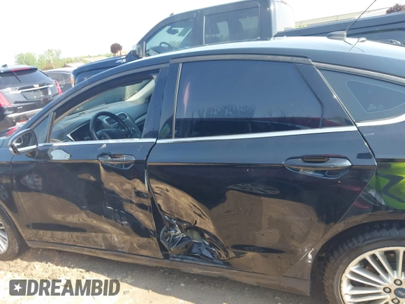 2017 Ford Fusion SE z VIN 3FA6P0H71HR135111, wystawiony jako IAAI lot #42454080 z przebiegiem 120 355 mil mil oraz . Historia ofert i sprzedaży dostępna na DreamBid. Obrazek 14.