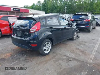 2019 Ford Fiesta SE z VIN 3FADP4EJ7KM102259, wystawiony jako IAAI lot #42265135 z przebiegiem 94 445 mil mil oraz . Historia ofert i sprzedaży dostępna na DreamBid. Obrazek 4.
