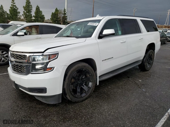 2015 Chevrolet Suburban LS with VIN 1GNSCHKC9FR667540, listed as a Copart auction lot 80908574 with 125,428 mi miles and Salvage Title. Bid and sale history available at carsss.com. Image 1.