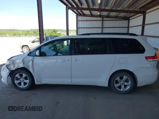 2014 Toyota Sienna LE AAS with VIN 5TDKK3DC2ES434546, listed as a IAAI auction lot 42227745 with 175,445 mi miles and . Bid and sale history available at DreamBid. Image 14.