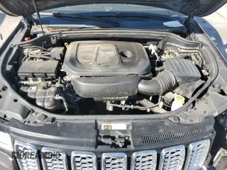 2017 Jeep Grand Cherokee Overland with VIN 1C4RJFCG9HC601806, listed as a Copart auction lot 61786275 with 122,898 mi miles and Salvage title. Bid and sale history available at DreamBid. Image 12.