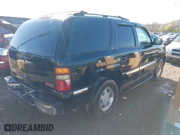 2001 GMC Yukon SLT with VIN 1GKEK13T41R164915, listed as a IAAI auction lot 41841669 with 291,154 mi miles. Bid and sale history available at carsss.com. Image 4.