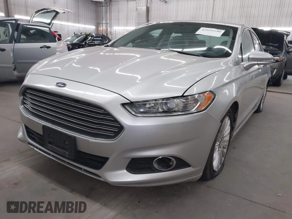 2013 Ford Fusion SE Hybrid with VIN 3FA6P0LU7DR228691, listed as a IAAI auction lot 42055540 with 144,389 mi miles and . Bid and sale history available at DreamBid. Image 17.