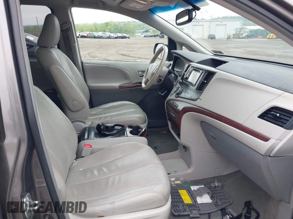 2014 Toyota Sienna XLE with VIN 5TDYK3DC0ES436502, listed as a IAAI auction lot 42180990 with 154,839 mi miles and . Bid and sale history available at DreamBid. Image 5.