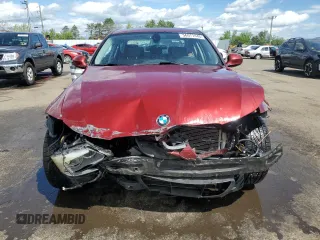 2011 BMW 3 Series 328i xDrive with VIN WBAPK5C5XBF123721, listed as a Copart auction lot 56071445 with 137,242 mi miles and Salvage title. Bid and sale history available at DreamBid. Image 5.