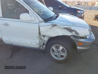 2002 Hyundai Santa Fe GLS with VIN KM8SC73D82U294374, listed as a IAAI auction lot 41204011 with 179,219 mi miles. Bid and sale history available at carsss.com. Image 6.