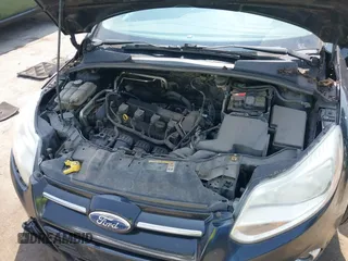 2012 Ford Focus SE with VIN 1FAHP3F28CL255965, listed as a IAAI auction lot 42469698 with 236,307 mi miles and . Bid and sale history available at DreamBid. Image 10.