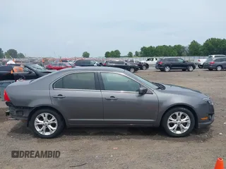 2012 Ford Fusion SE with VIN 3FAHP0HA9CR141588, listed as a IAAI auction lot 42485632 with 124,312 mi miles and . Bid and sale history available at DreamBid. Image 13.