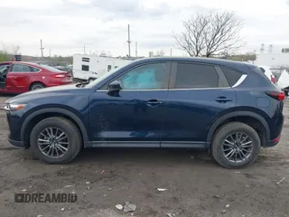 2021 Mazda CX-5 Touring with VIN JM3KFBCM1M1336457, listed as a IAAI auction lot 42034330 with 39,910 mi miles. Bid and sale history available at carsss.com. Image 13.
