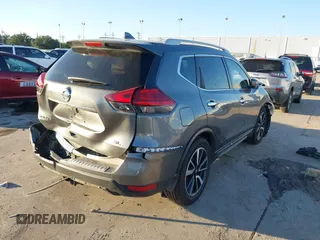 2017 Nissan Rogue SL with VIN 5N1AT2MT2HC859544, listed as a IAAI auction lot 40773928 with 200,265 mi miles and . Bid and sale history available at DreamBid. Image 4.