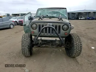 2008 Jeep Wrangler Sahara with VIN 1J4FA54178L653453, listed as a Copart auction lot 45490235 with 95,250 mi miles and Salvage title. Bid and sale history available at DreamBid. Image 11.