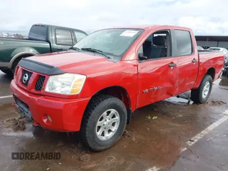 2005 Nissan Titan SE with VIN 1N6AA07B25N553619, listed as a IAAI auction lot 41560930 with 169,561 mi miles. Bid and sale history available at carsss.com. Image 2.