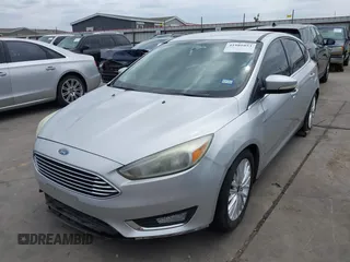 2015 Ford Focus Titanium with VIN 1FADP3N23FL356822, listed as a IAAI auction lot 41981053 with 115,584 mi miles and . Bid and sale history available at DreamBid. Image 2.