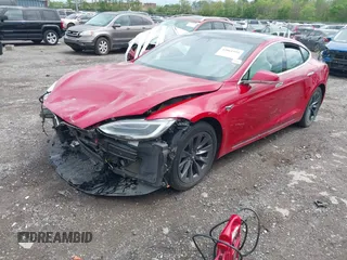 2018 Tesla Model S 75D with VIN 5YJSA1E21JF275546, listed as a IAAI auction lot 42061595 with Not Provided miles and . Bid and sale history available at DreamBid. Image 2.