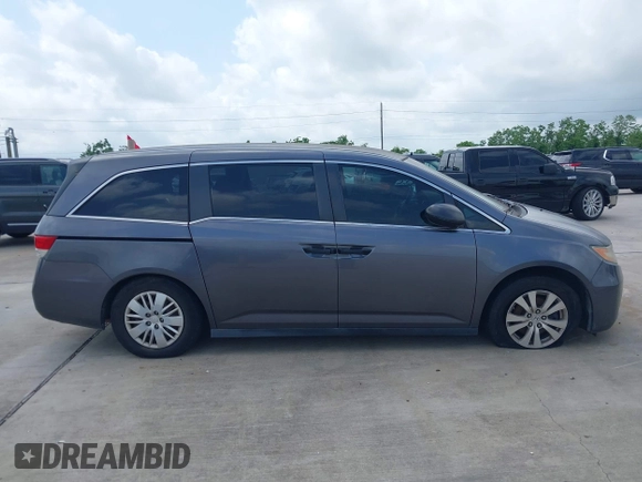2016 Honda Odyssey LX with VIN 5FNRL5H27GB003250, listed as a IAAI auction lot 42103335 with 151,516 mi miles and . Bid and sale history available at DreamBid. Image 13.