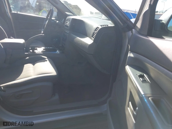 2007 Jeep Grand Cherokee Laredo with VIN 1J8GS48K17C516150, listed as a IAAI auction lot 41752720 with 176,114 mi miles. Bid and sale history available at carsss.com. Image 5.