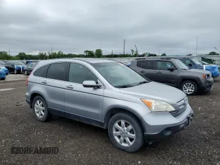 2007 Honda CR-V EX-L z VIN JHLRE48767C107065, wystawiony jako Copart lot #57261965 z przebiegiem 160 752 mil mil oraz Szkoda całkowita • Salvage title. Historia ofert i sprzedaży dostępna na DreamBid. Obrazek 4.