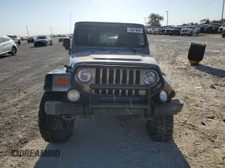 2003 Jeep Wrangler Rubicon with VIN 1J4FA69S73P339925, listed as a Copart auction lot 75341094 with Not provided miles and Salvage title. Bid and sale history available at DreamBid. Image 5.