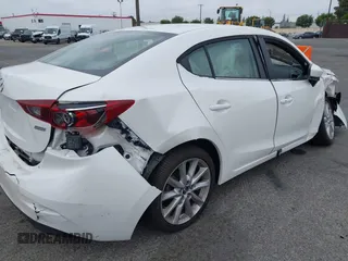 2017 Mazda 3 Touring with VIN 3MZBN1V72HM121902, listed as a IAAI auction lot 39193644 with 40,113 mi miles and . Bid and sale history available at DreamBid. Image 4.