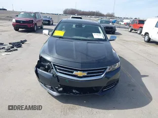 2015 Chevrolet Impala LTZ with VIN 1G1165S39FU138640, listed as a IAAI auction lot 41780288 with 145,000 mi miles and . Bid and sale history available at DreamBid. Image 13.