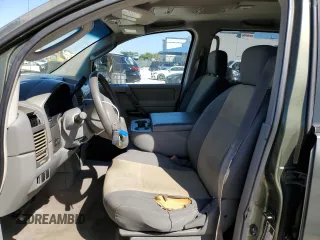 2004 Nissan Titan LE with VIN 1N6AA07AX4N512077, listed as a Copart auction lot 46105645 with 175,412 mi miles and Salvage Title. Bid and sale history available at DreamBid. Image 7.