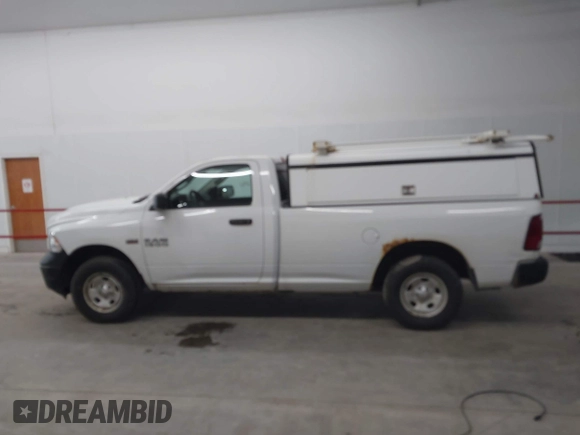 2014 Ram 1500 Tradesman z VIN 3C6JR7DT6EG285109, wystawiony jako IAAI lot #42306741 z przebiegiem 218 286 mil mil oraz . Historia ofert i sprzedaży dostępna na DreamBid. Obrazek 14.