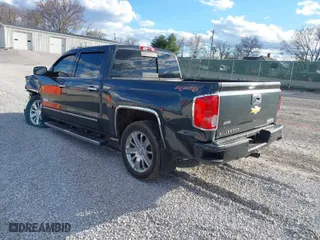 2017 Chevrolet Silverado 1500 High Country with VIN 3GCUKTEC4HG367121, listed as a IAAI auction lot 41649608 with 148,678 mi miles. Bid and sale history available at carsss.com. Image 3.