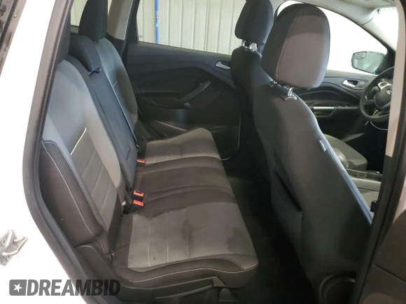 2013 Ford Escape SE z VIN 1FMCU9G96DUC02216, wystawiony jako Copart lot #63431115 z przebiegiem 186 614 mil mil oraz Szkoda całkowita • Salvage title. Historia ofert i sprzedaży dostępna na DreamBid. Obrazek 11.