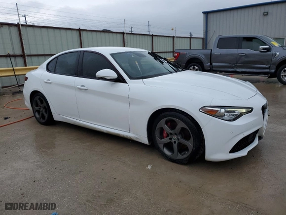 2018 Alfa Romeo Giulia with VIN ZARFAEBN3J7591484, listed as a Copart auction lot 86514884 with 94,276 mi miles and Salvage Title. Bid and sale history available at carsss.com. Image 4.