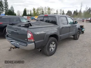 2013 Toyota Tacoma with VIN 3TMLU4EN5DM113393, listed as a IAAI auction lot 42003883 with 288,889 mi miles and . Bid and sale history available at carsss.com. Image 4.