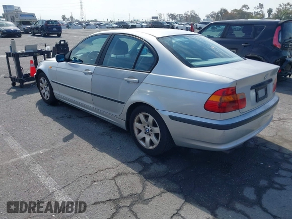 2002 BMW 3 Series 325i with VIN WBAET37492NG83135, listed as a IAAI auction lot 42028502 with 184,216 mi miles. Bid and sale history available at carsss.com. Image 3.