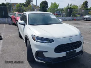 2025 Honda HR-V EX-L z VIN 3CZRZ1H71SM704366, wystawiony jako IAAI lot #42039805 z przebiegiem 17 454 mil mil oraz . Historia ofert i sprzedaży dostępna na DreamBid. Obrazek 1.