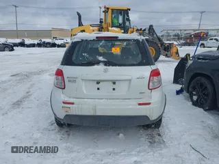 2012 Suzuki SX4 Crossover with VIN JS2YB5A31C6304822, listed as a IAAI auction lot 41366800 with 123,672 mi miles and . Bid and sale history available at DreamBid. Image 16.