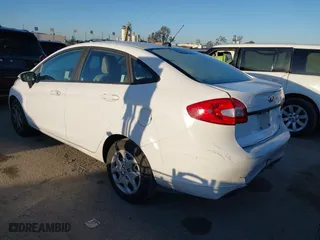 2013 Ford Fiesta S with VIN 3FADP4AJXDM156194, listed as a IAAI auction lot 41870811 with 89,446 mi miles. Bid and sale history available at carsss.com. Image 3.