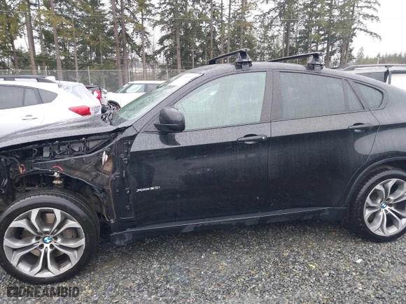 2014 BMW X6 50i with VIN 5UXFG8C57EL593257, listed as a IAAI auction lot 41655486 with 128,292 mi miles. Bid and sale history available at carsss.com. Image 15.