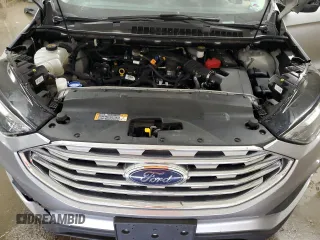 2020 Ford Edge SE z VIN 2FMPK4G9XLBA07766, wystawiony jako Copart lot #56852365 z przebiegiem 151 664 mil mil oraz Szkoda całkowita • Salvage title. Historia ofert i sprzedaży dostępna na DreamBid. Obrazek 12.