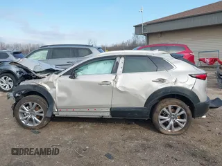 2023 Mazda CX-30 S Premium with VIN 3MVDMBDMXPM563500, listed as a IAAI auction lot 42092423 with 9,148 mi miles and . Bid and sale history available at DreamBid. Image 15.