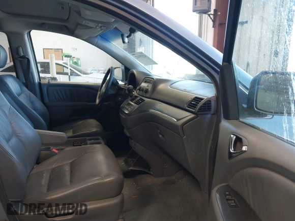 2007 Honda Odyssey EX-L z VIN 5FNRL38617B078923, wystawiony jako IAAI lot #42335122 z przebiegiem 154 352 mil mil oraz . Historia ofert i sprzedaży dostępna na DreamBid. Obrazek 5.