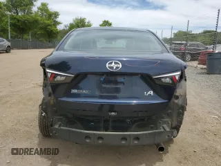 2016 Scion iA z VIN 3MYDLBZV5GY130652, wystawiony jako Copart lot #57396295 z przebiegiem 22 603 mil mil oraz Szkody całkowita. Historia ofert i sprzedaży dostępna na DreamBid. Obrazek 6.