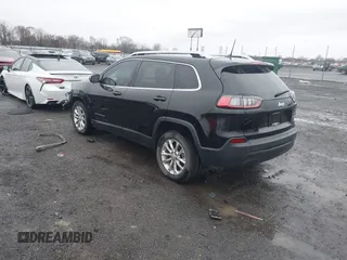 2019 Jeep Cherokee Latitude with VIN 1C4PJLCB1KD339906, listed as a IAAI auction lot 41539248 with 123,243 mi miles and . Bid and sale history available at carsss.com. Image 3.