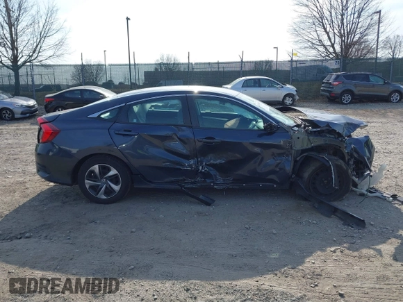 2020 Honda Civic LX z VIN 2HGFC2F61LH570034, wystawiony jako IAAI lot #41784357 z przebiegiem Nie podano mil oraz . Historia ofert i sprzedaży dostępna na DreamBid. Obrazek 12.