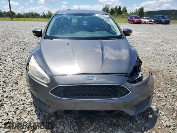 2016 Ford Focus SE with VIN 1FADP3F29GL233719, listed as a Copart auction lot 56857705 with 140,785 mi miles and Salvage title. Bid and sale history available at DreamBid. Image 5.